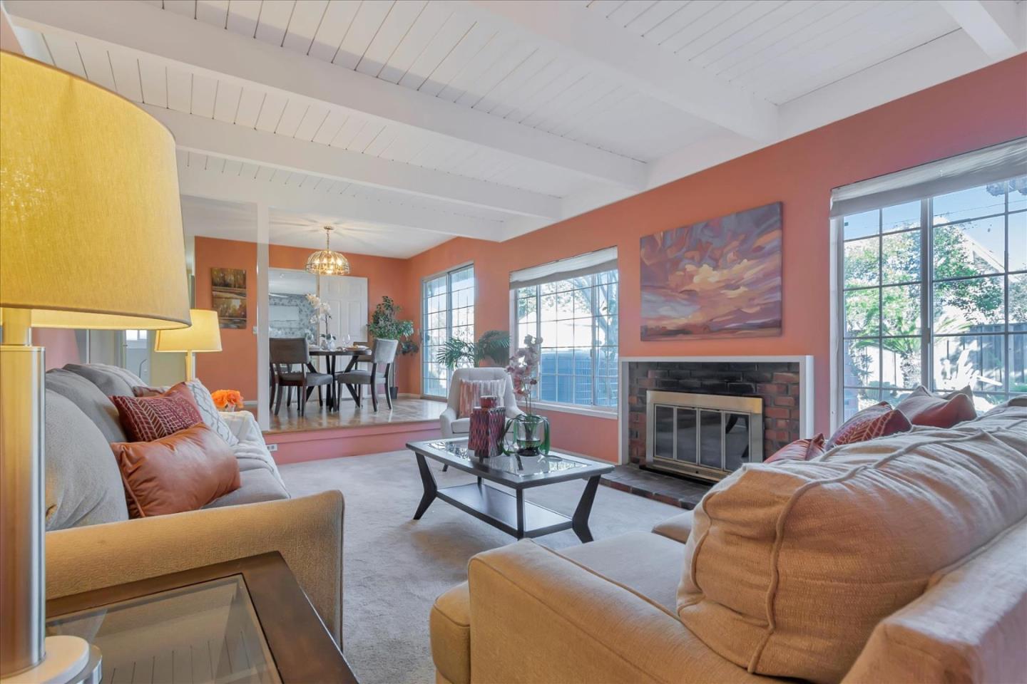 727 Valley Way Santa Clara, CA 95051 - Photo 7 of 52 a living room with furniture and a fireplace