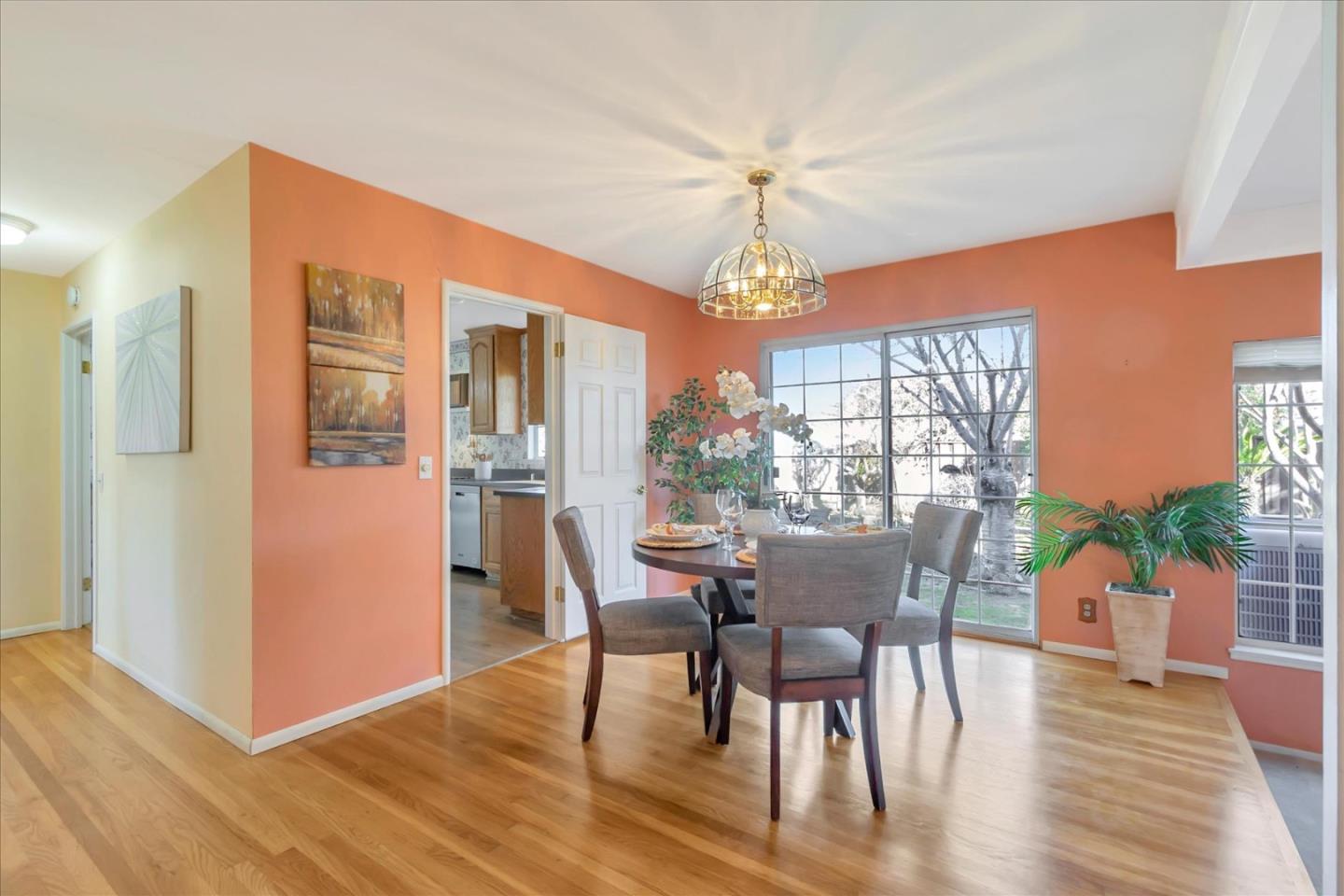 727 Valley Way Santa Clara, CA 95051 - Photo 8 of 52 a view of a dining room with furniture window and wooden floor