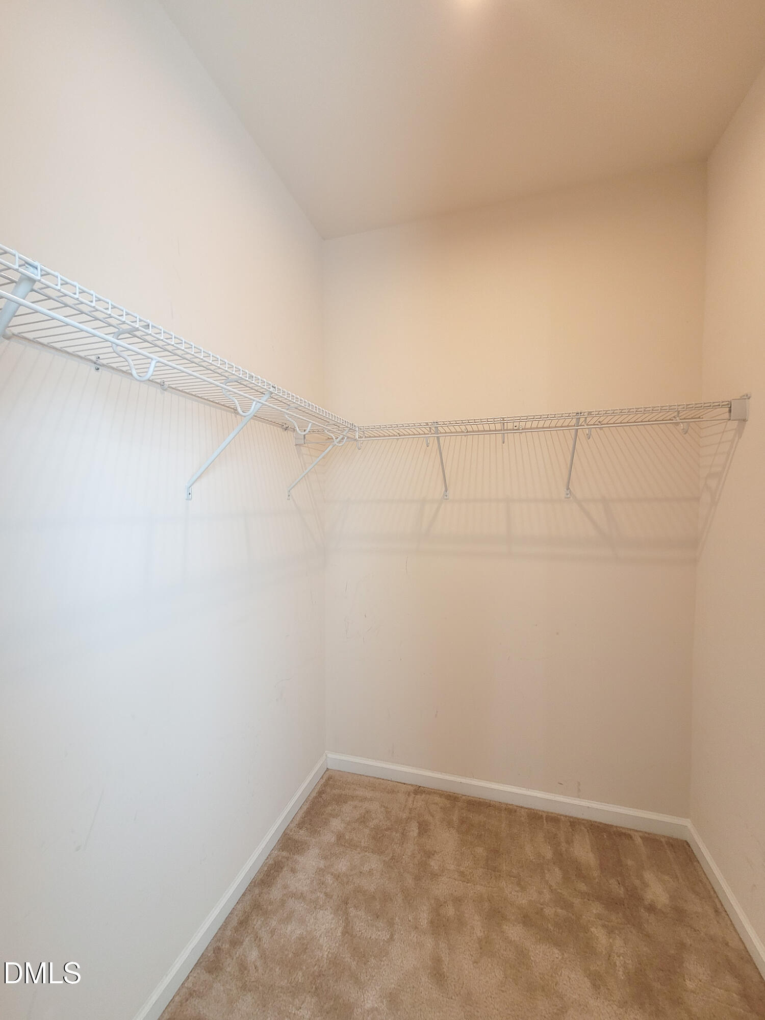 8951 Commons Townes Drive Raleigh, NC 27616 - Photo 20 of 40 a view of a room with racks on the wall