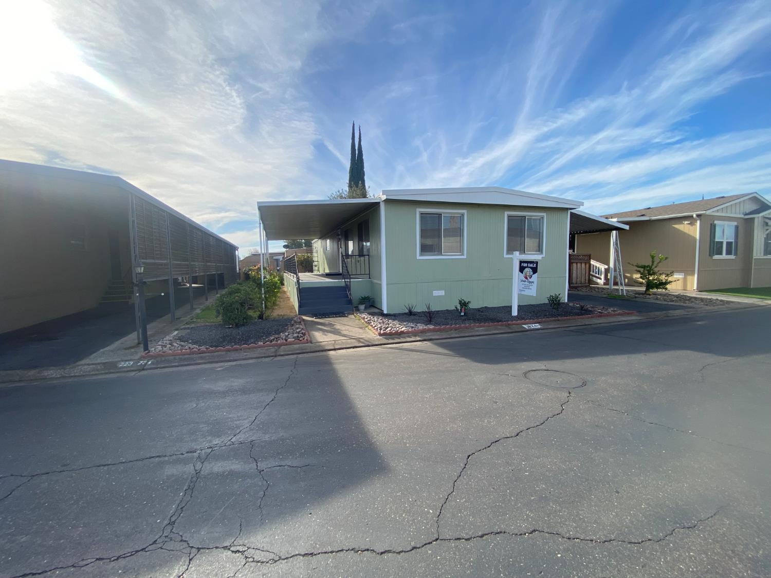 2621 Prescott Road, Unit 224 224 Modesto, CA 95350 - Photo 2 of 23 a view of a house with couches and backyard
