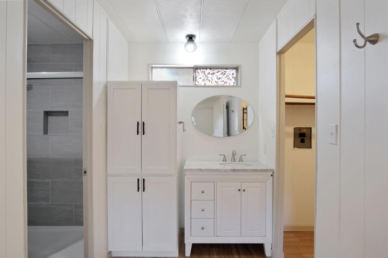 2621 Prescott Road, Unit 224 224 Modesto, CA 95350 - Photo 21 of 23 a bathroom with a sink and a mirror