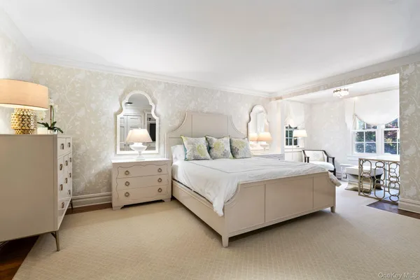 a bed room with furniture and a window