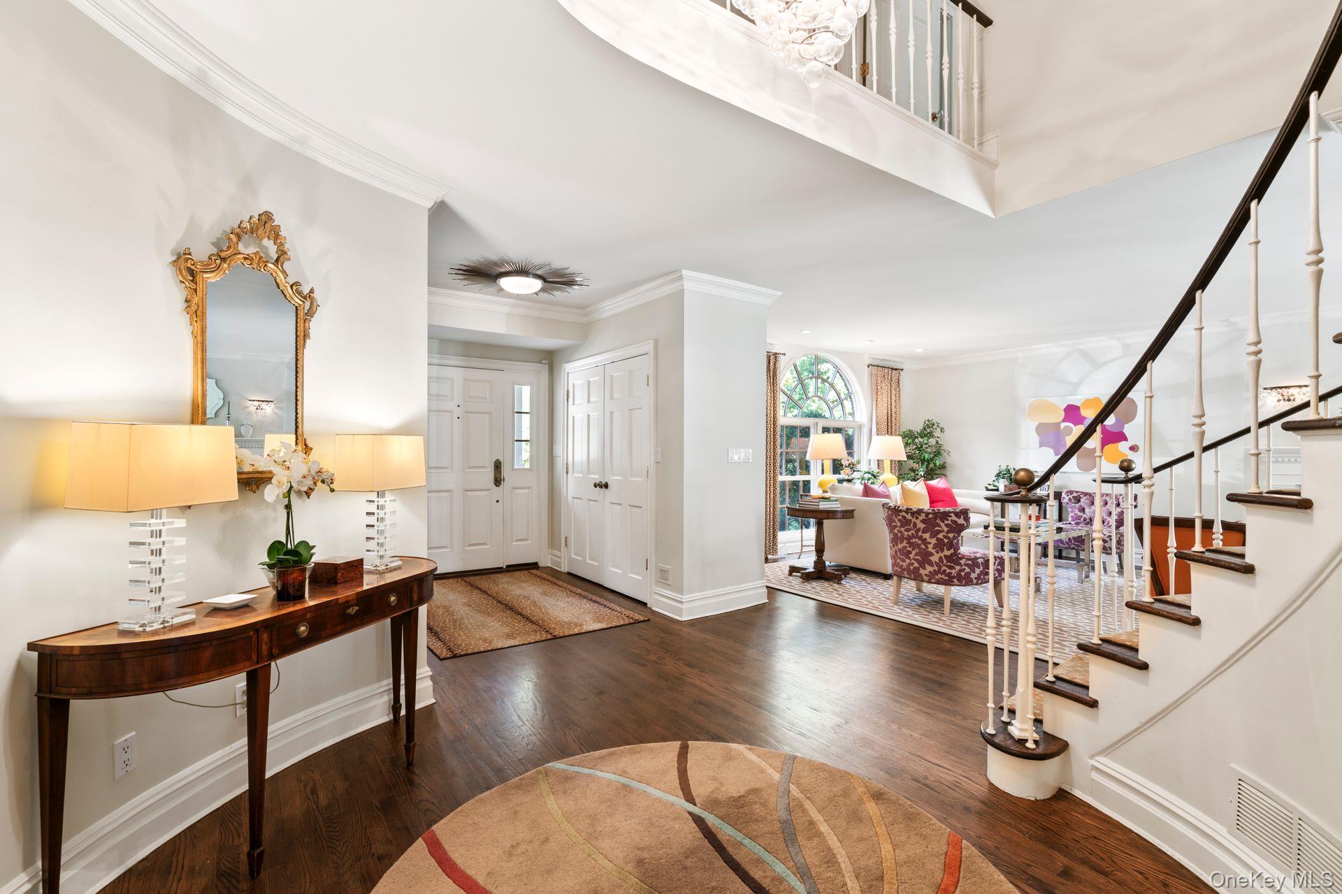 30 Underhill Road Locust Valley, NY 11560 - Photo 4 of 32 a living room with lots of furniture and a wooden floor