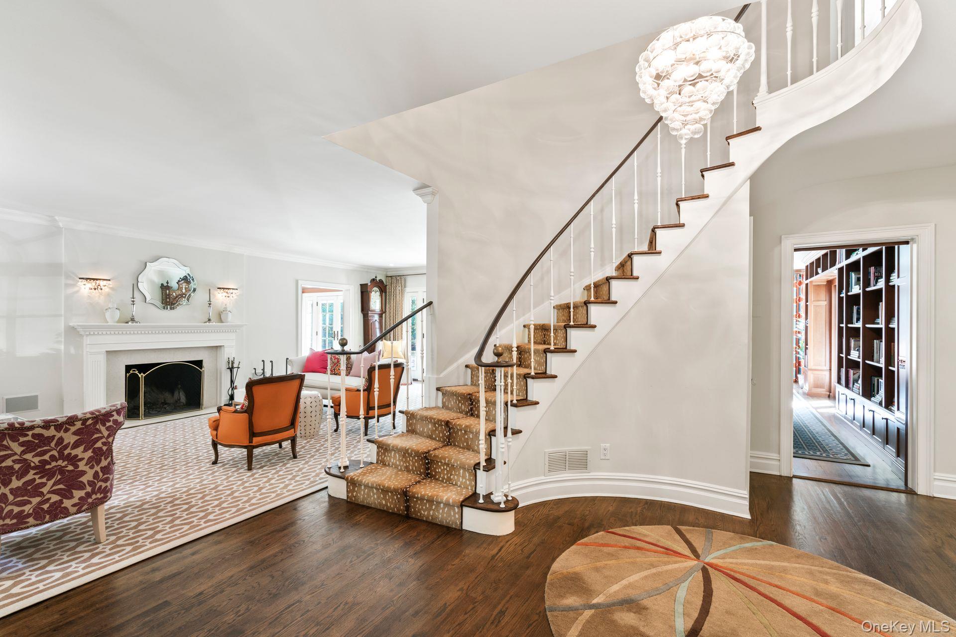 30 Underhill Road Locust Valley, NY 11560 - Photo 5 of 32 a view of hall way with furniture and fireplace
