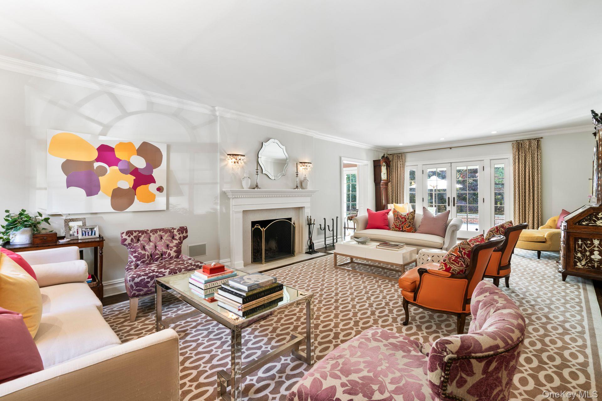 30 Underhill Road Locust Valley, NY 11560 - Photo 6 of 32 a living room with furniture fireplace and window