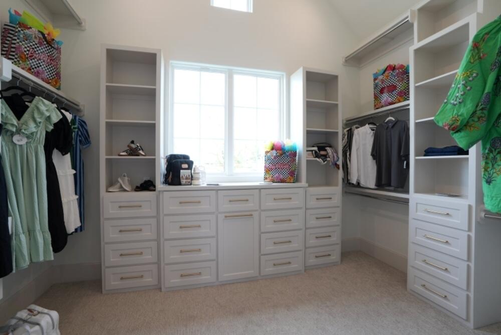 4101 149th Street Lubbock, TX 79423 - Photo 35 of 53 a view of walk in closet with clothes and shoes