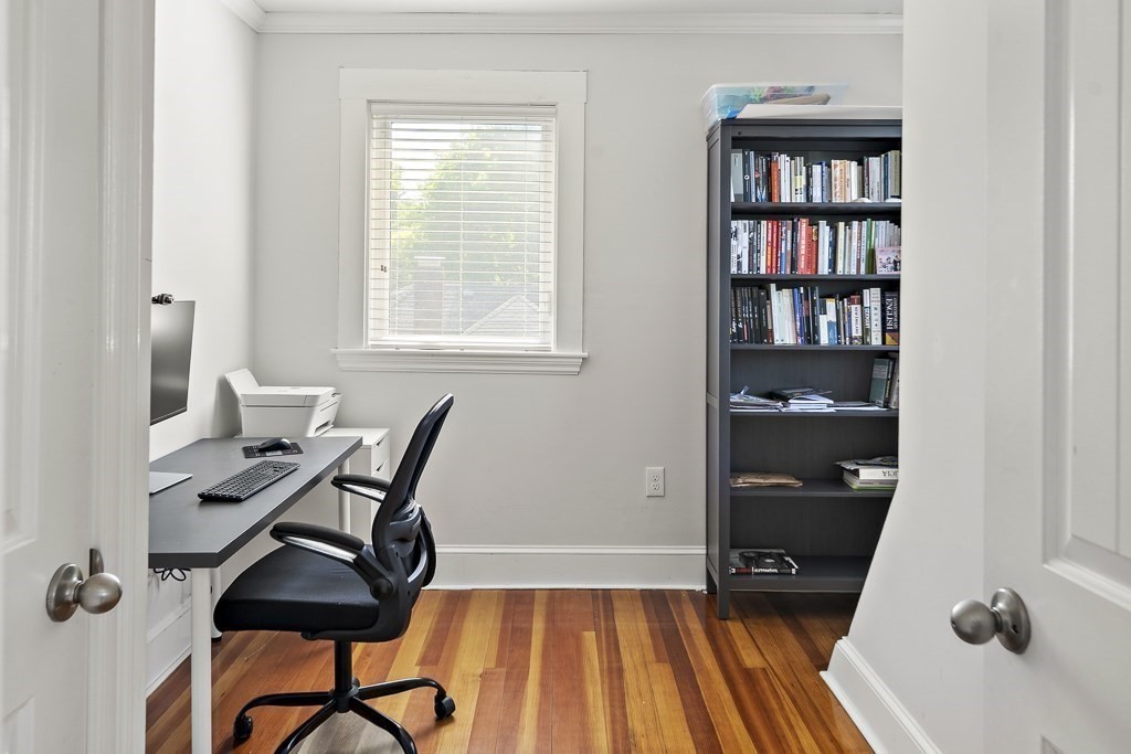 1281 Walnut Street, Unit 2 Newton, MA 02461 - Photo 19 of 30 a view of a workspace with furniture and a window
