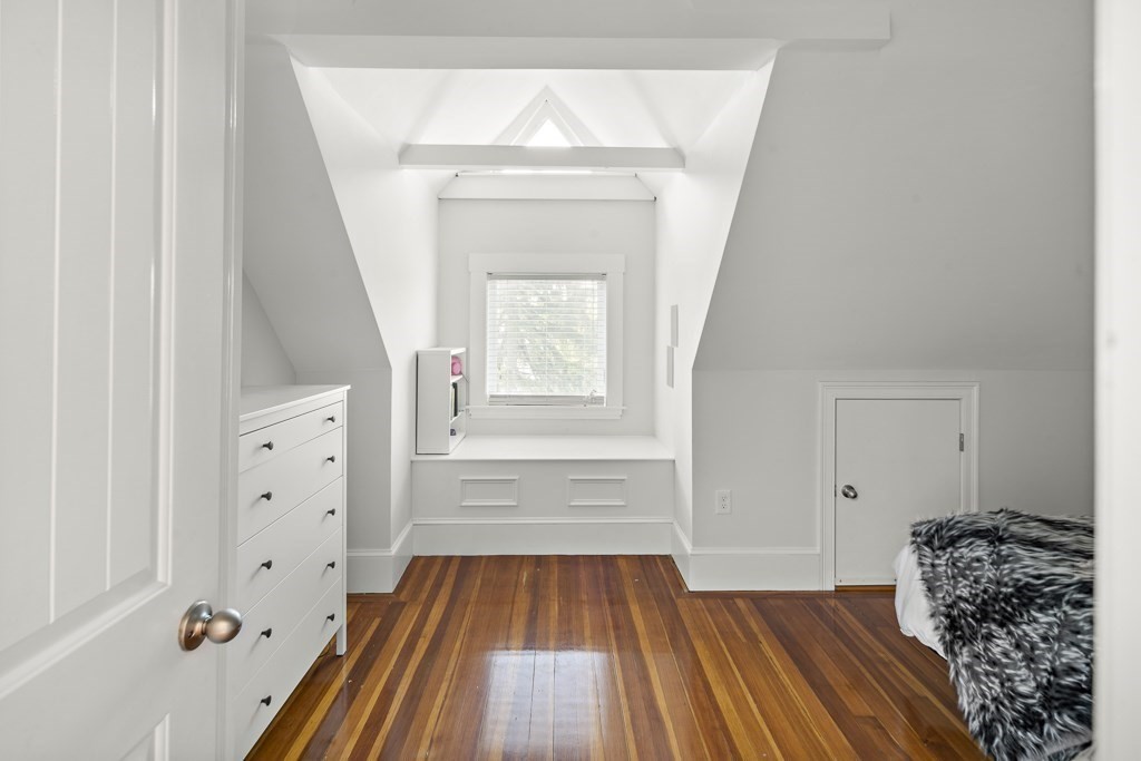1281 Walnut Street, Unit 2 Newton, MA 02461 - Photo 21 of 30 a view of a livingroom with wooden floor and entryway