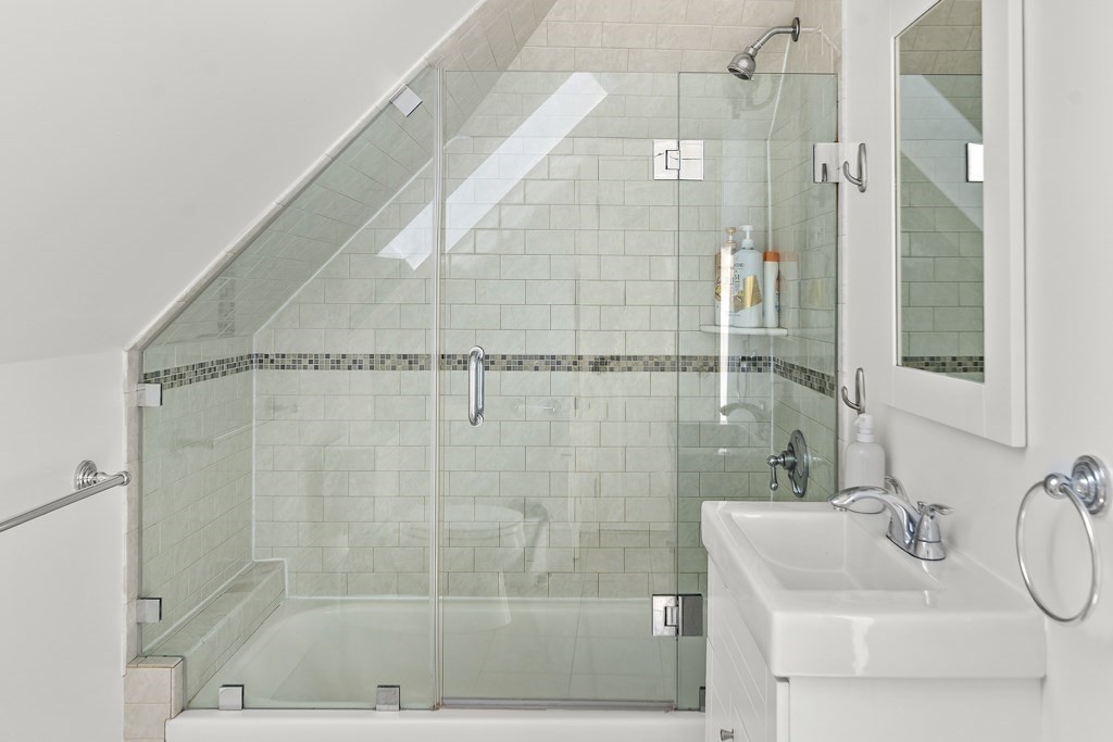 1281 Walnut Street, Unit 2 Newton, MA 02461 - Photo 24 of 30 a bathroom with a shower and a sink