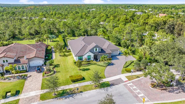 an aerial view of a house with a garden