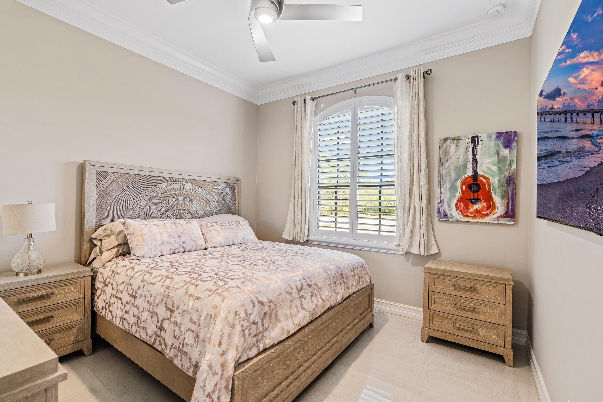 19240 Southeast Hidden Bridge Court Jupiter, FL 33458 - Photo 29 of 42 a bedroom with a bed and a window