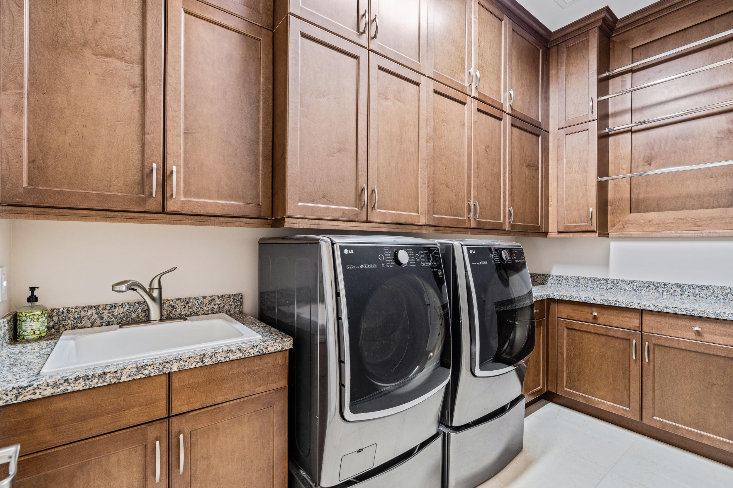 19240 Southeast Hidden Bridge Court Jupiter, FL 33458 - Photo 31 of 42 a utility room with dryer and washer