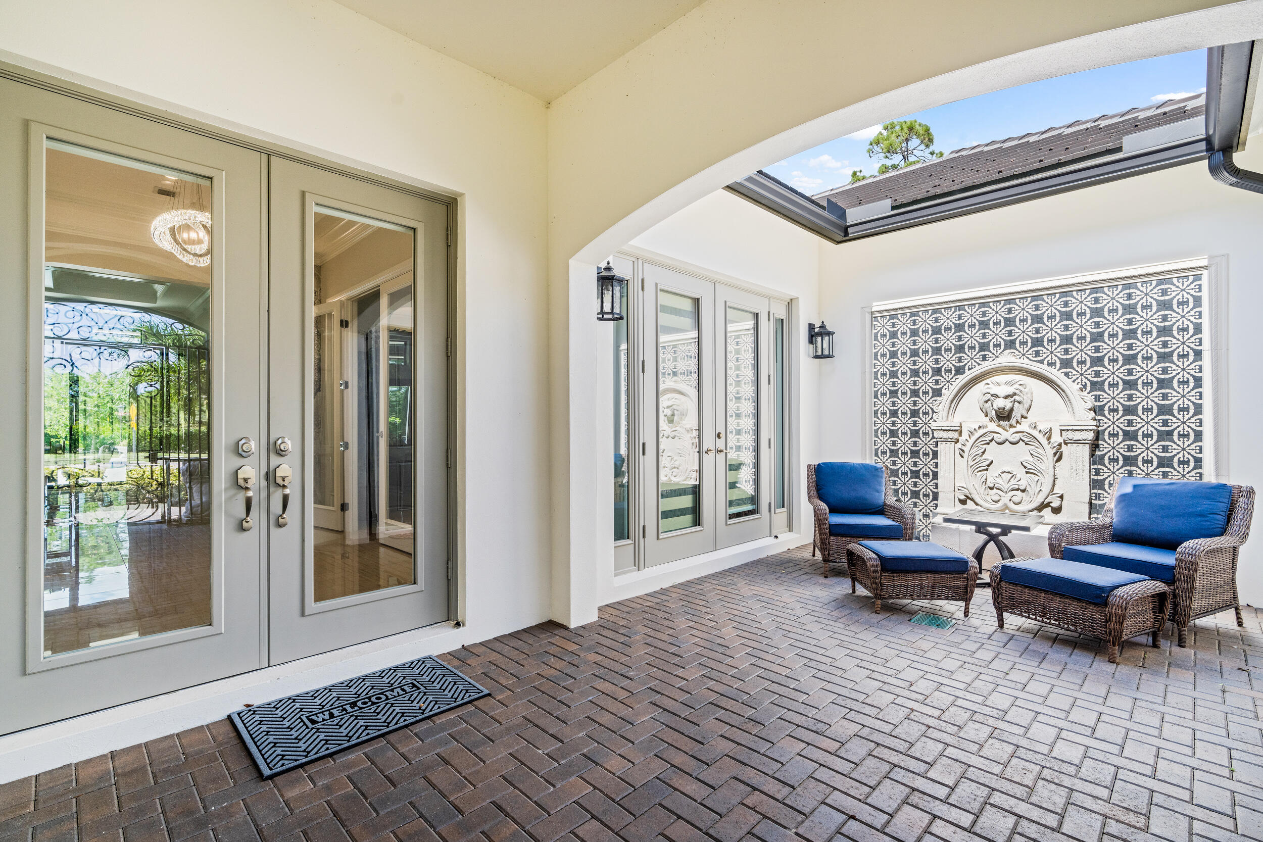 19240 Southeast Hidden Bridge Court Jupiter, FL 33458 - Photo 6 of 42 a living room with furniture and a window