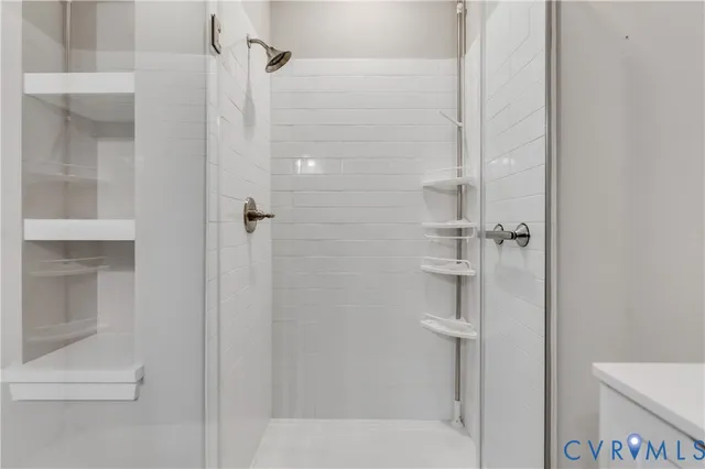 a lobby with furniture and a large window