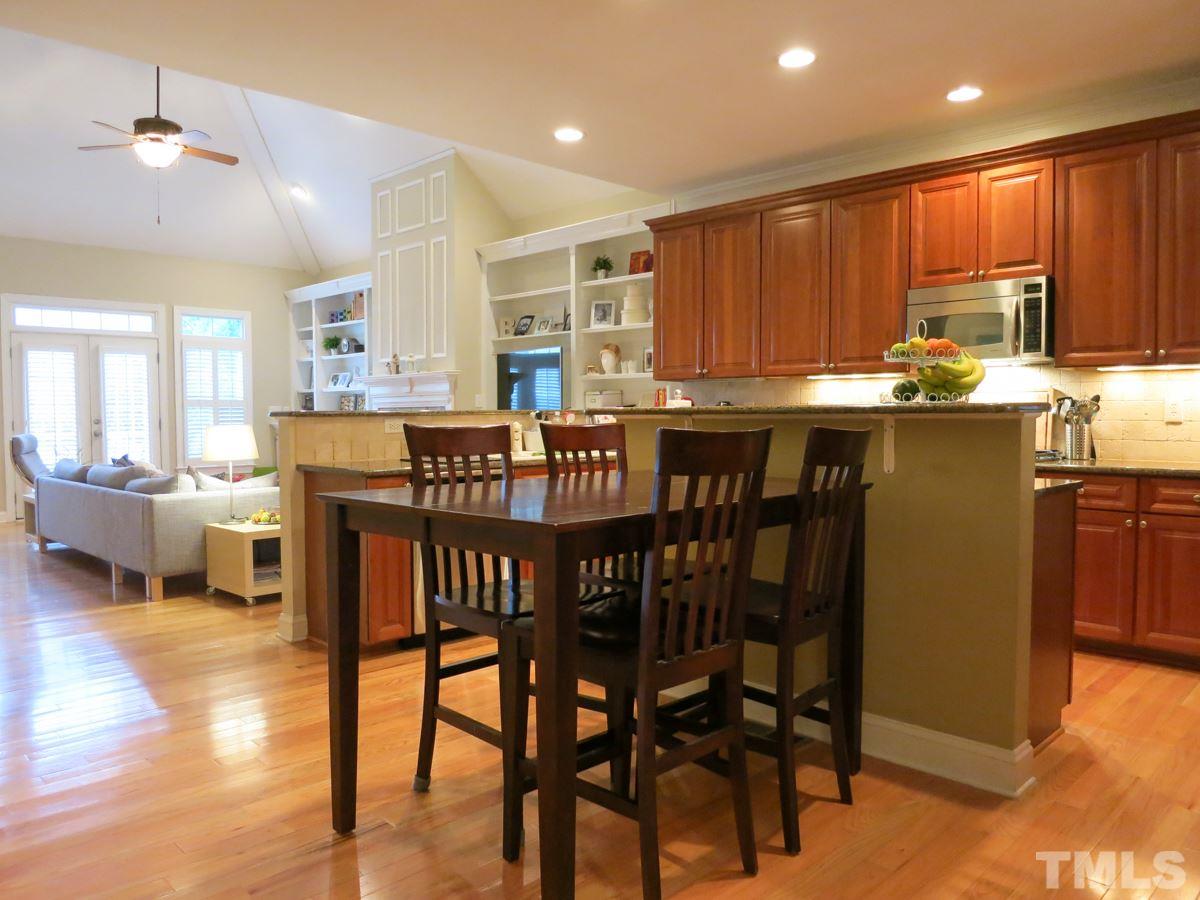 3205 Canes Way Raleigh, NC 27614 - Photo 10 of 25 The Bfast area is open to the Kitchen & Living Rm.