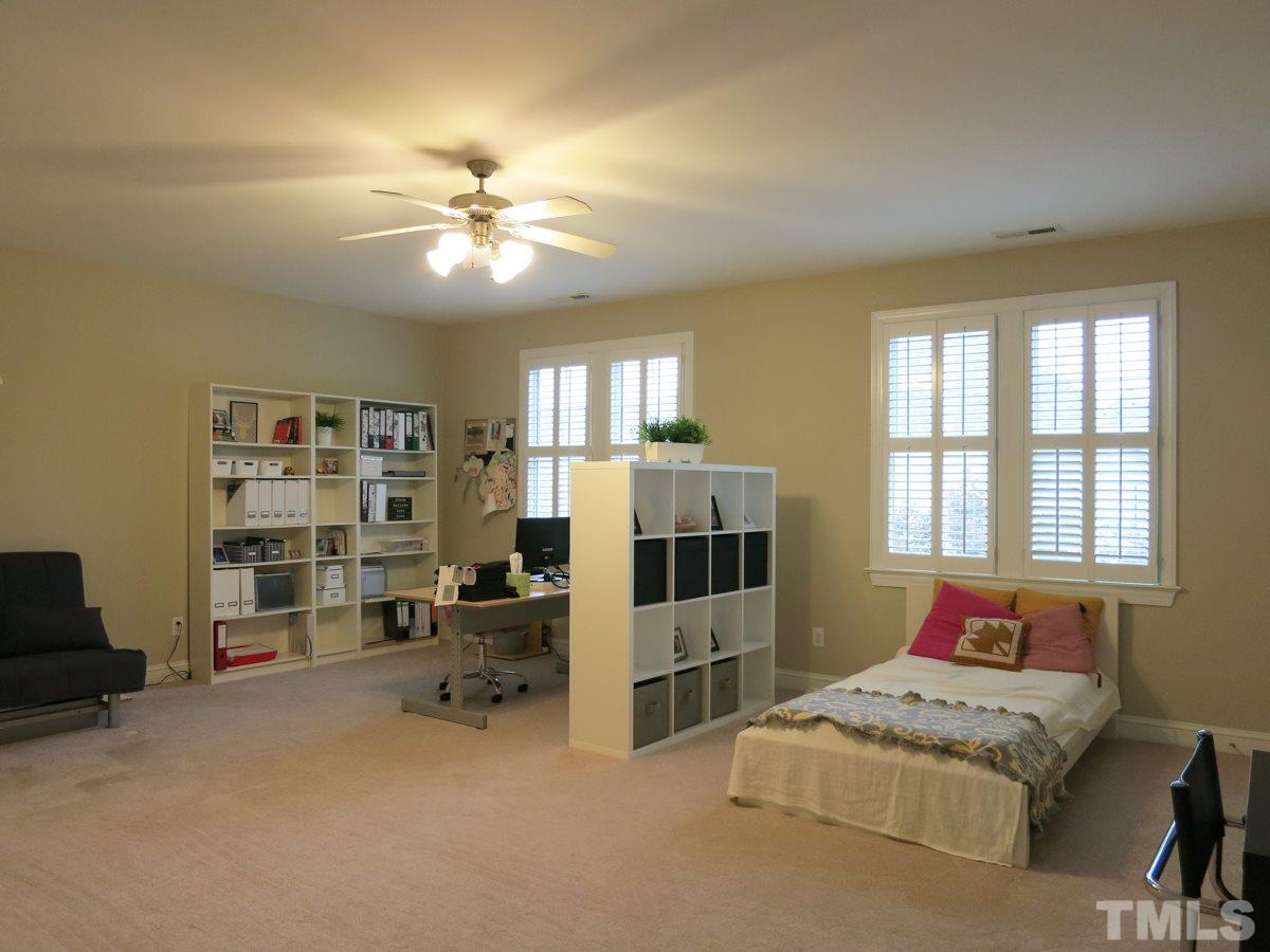 3205 Canes Way Raleigh, NC 27614 - Photo 15 of 25 The huge Bonus Rm or Bedroom offers a closet, neutral carpet & CF.