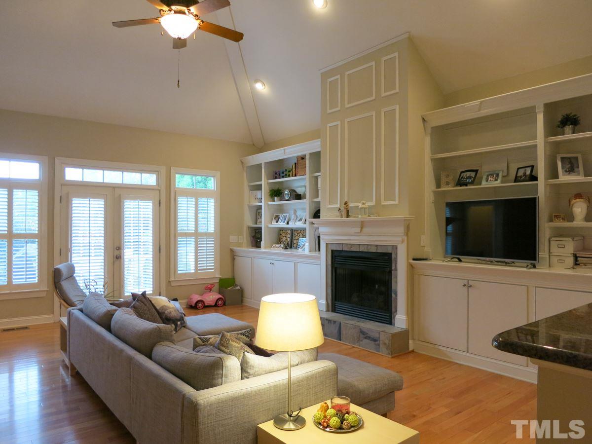3205 Canes Way Raleigh, NC 27614 - Photo 4 of 25 BIG vaulted Living Rm w/built-in cabinetry, hardwood flr, CF & gorgeous FP.
