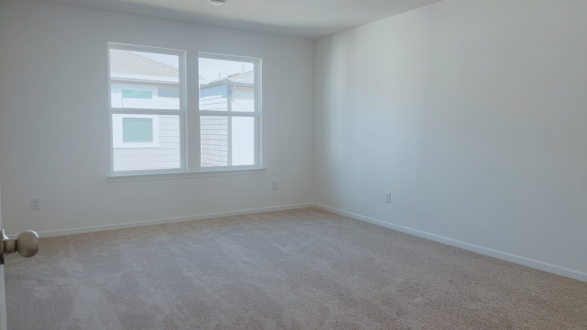 10212 Gates Mill Road Houston, TX 77034 - Photo 12 of 17 an empty room with a window