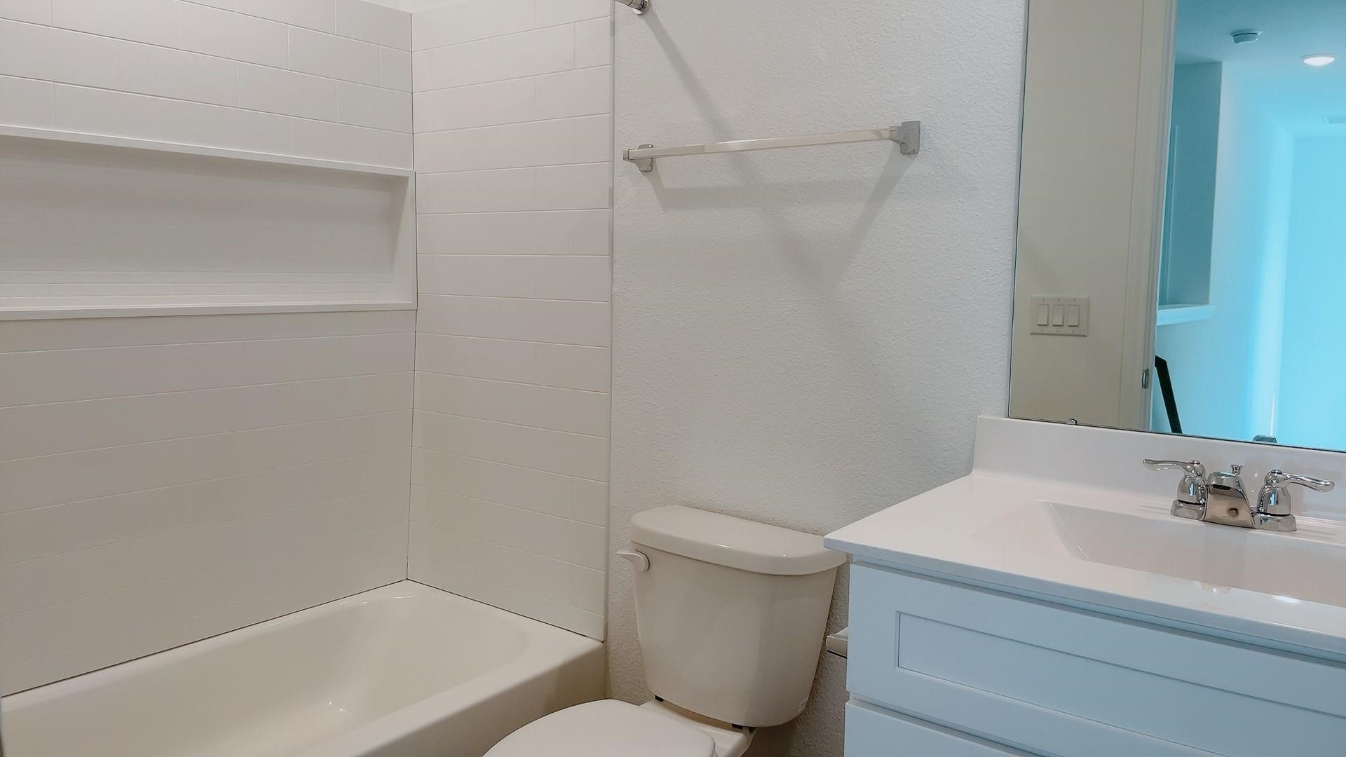 10212 Gates Mill Road Houston, TX 77034 - Photo 13 of 17 a bathroom with a sink and a toilet