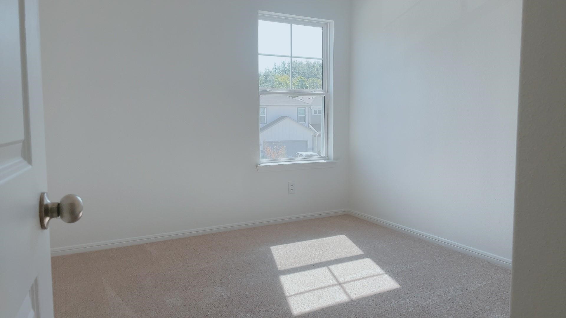 10212 Gates Mill Road Houston, TX 77034 - Photo 15 of 17 an empty room with a window