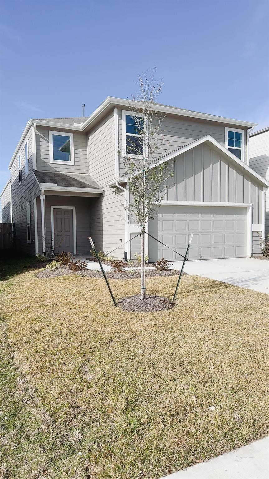 10212 Gates Mill Road Houston, TX 77034 - Photo 3 of 17 a view of a house with a yard