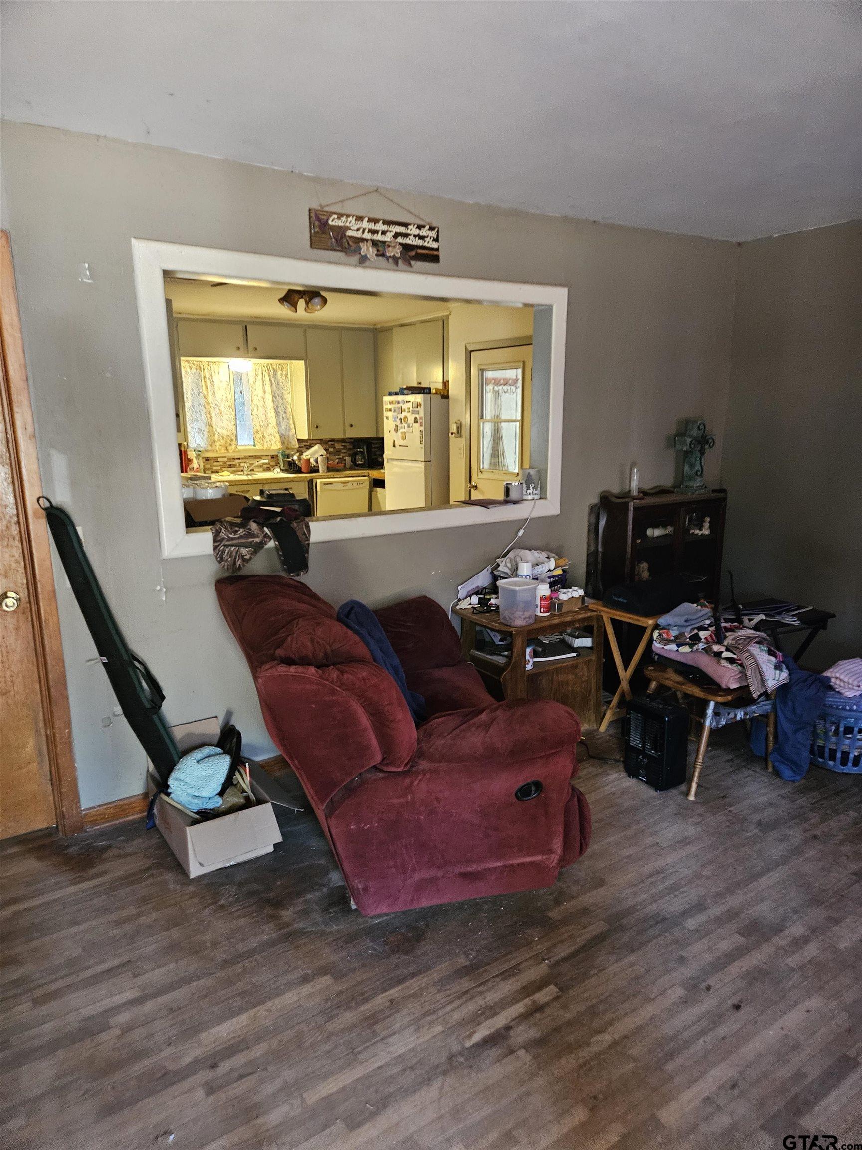 5542 Farm To Market Road 752 Rusk, TX 75785 - Photo 20 of 41 a living room with furniture window and wooden floor