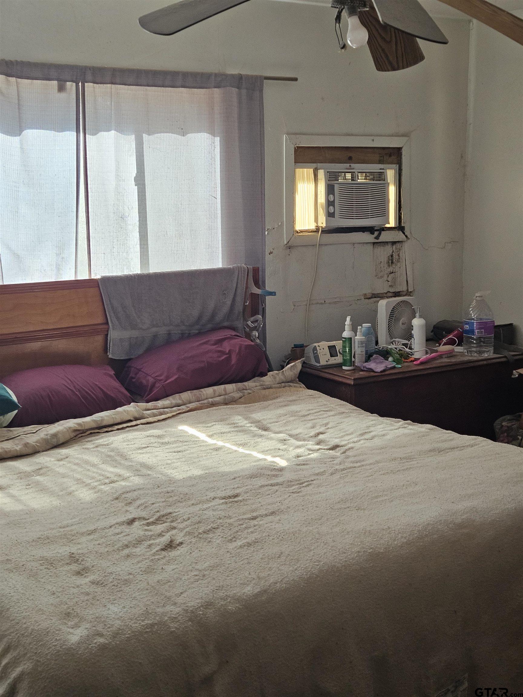 5542 Farm To Market Road 752 Rusk, TX 75785 - Photo 25 of 41 a bedroom with a bed and window