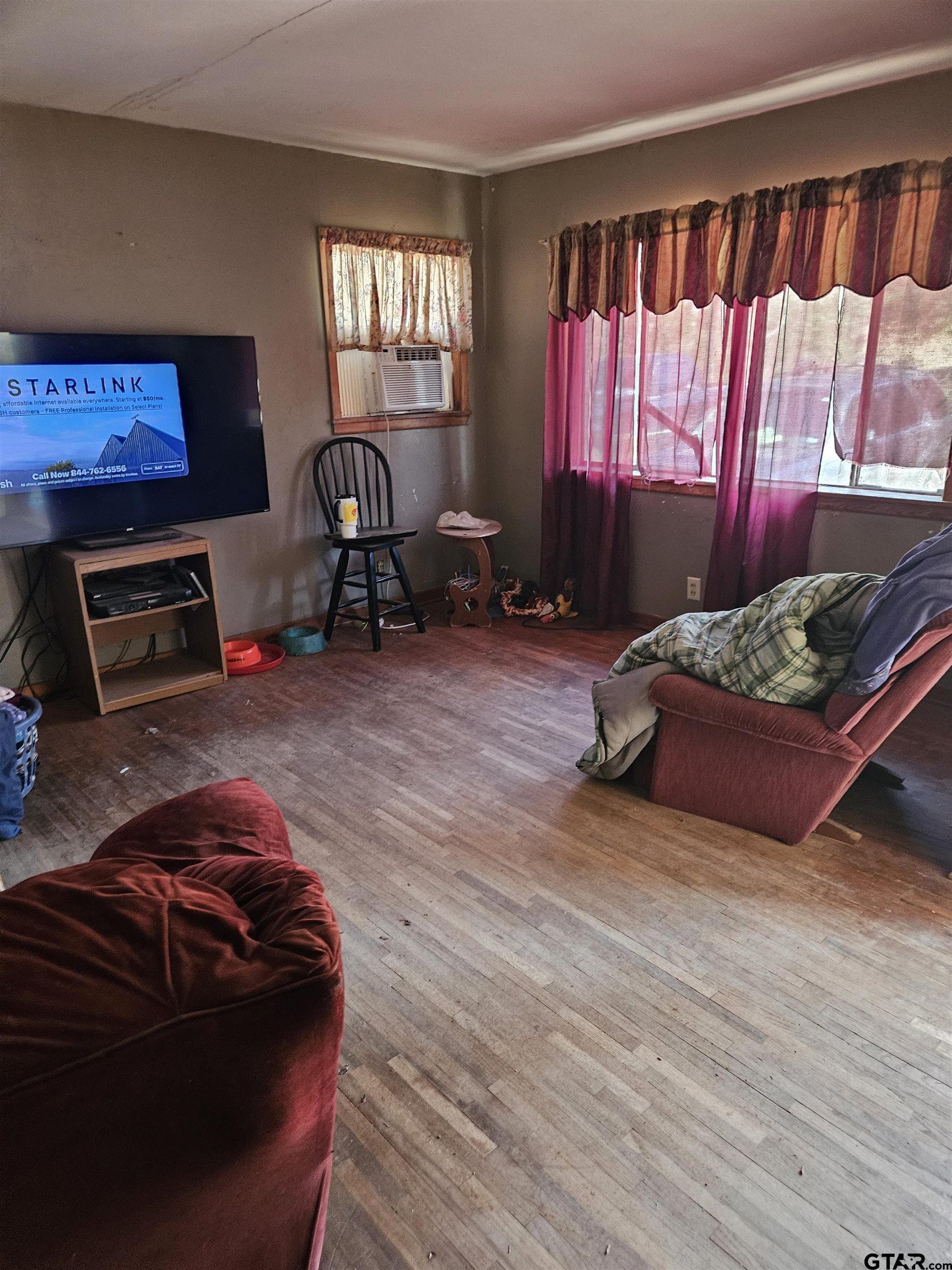 5542 Farm To Market Road 752 Rusk, TX 75785 - Photo 3 of 41 a bedroom with a bed and a window