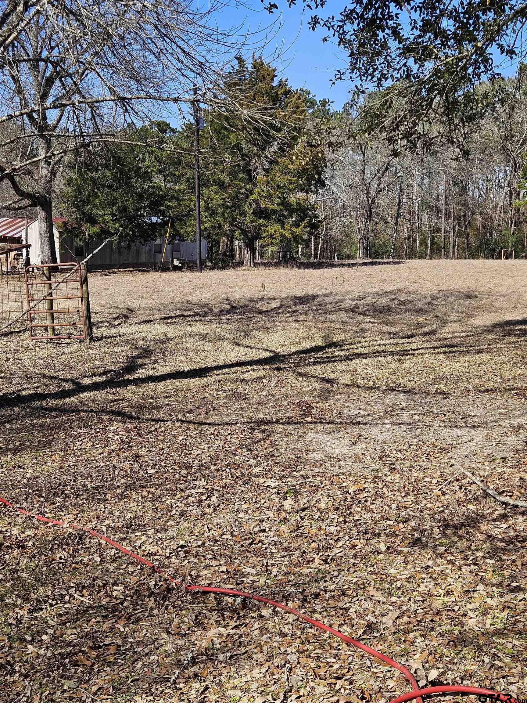 5542 Farm To Market Road 752 Rusk, TX 75785 - Photo 34 of 41 a view of a yard covered with snow