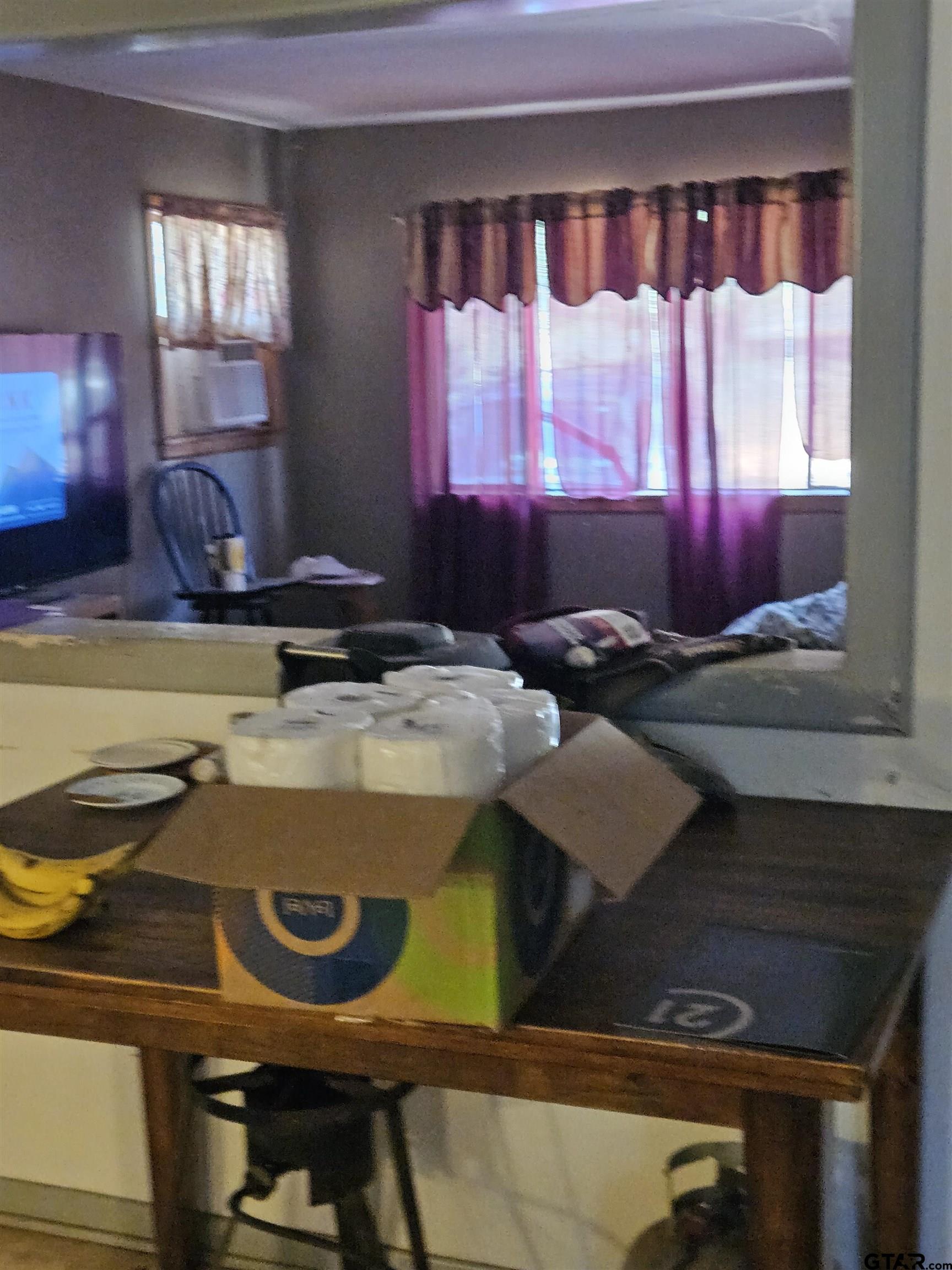 5542 Farm To Market Road 752 Rusk, TX 75785 - Photo 4 of 41 a bathroom with a sink and a mirror