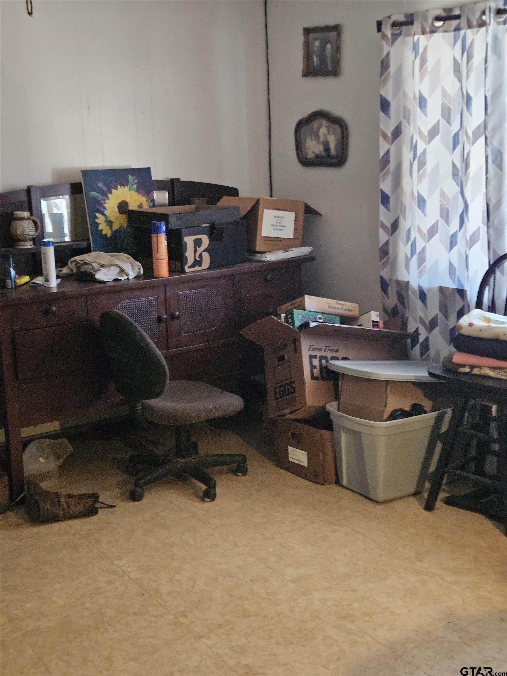 5542 Farm To Market Road 752 Rusk, TX 75785 - Photo 10 of 41 a room with a desk and a chair