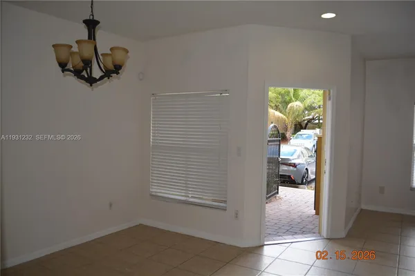 a view of entryway and hall with a window