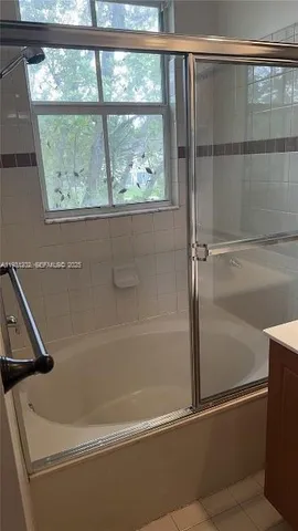 a bathroom with a bathtub