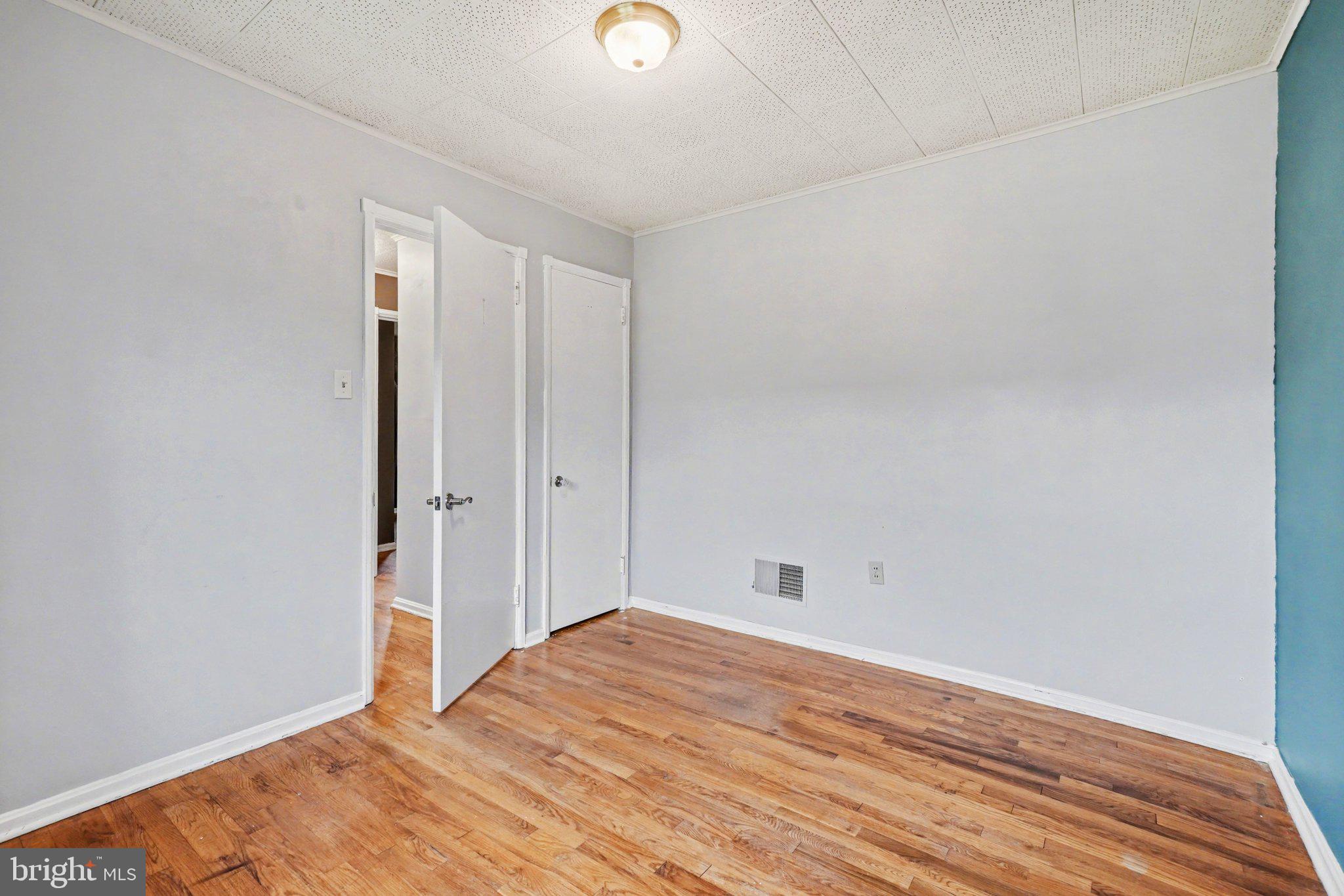1309 Kingsley Road Camp Hill, PA 17011 - Photo 13 of 30 a view of empty room with wooden floor