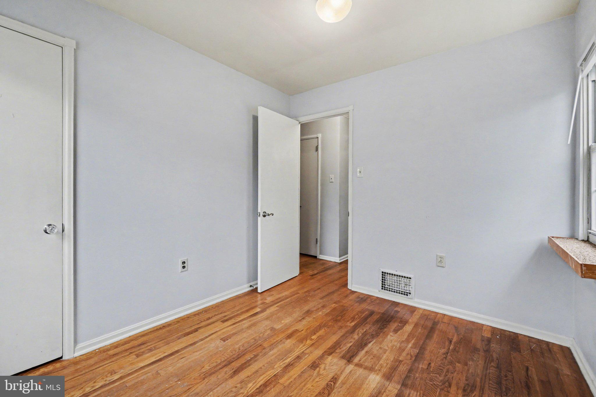 1309 Kingsley Road Camp Hill, PA 17011 - Photo 16 of 30 a view of a room with wooden floor