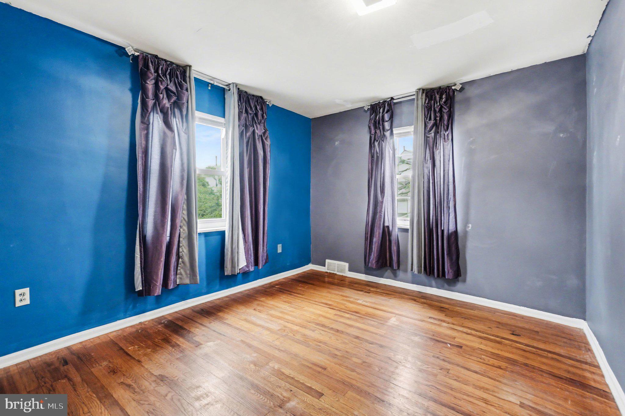 1309 Kingsley Road Camp Hill, PA 17011 - Photo 17 of 30 a view of a room with wooden floor and windows
