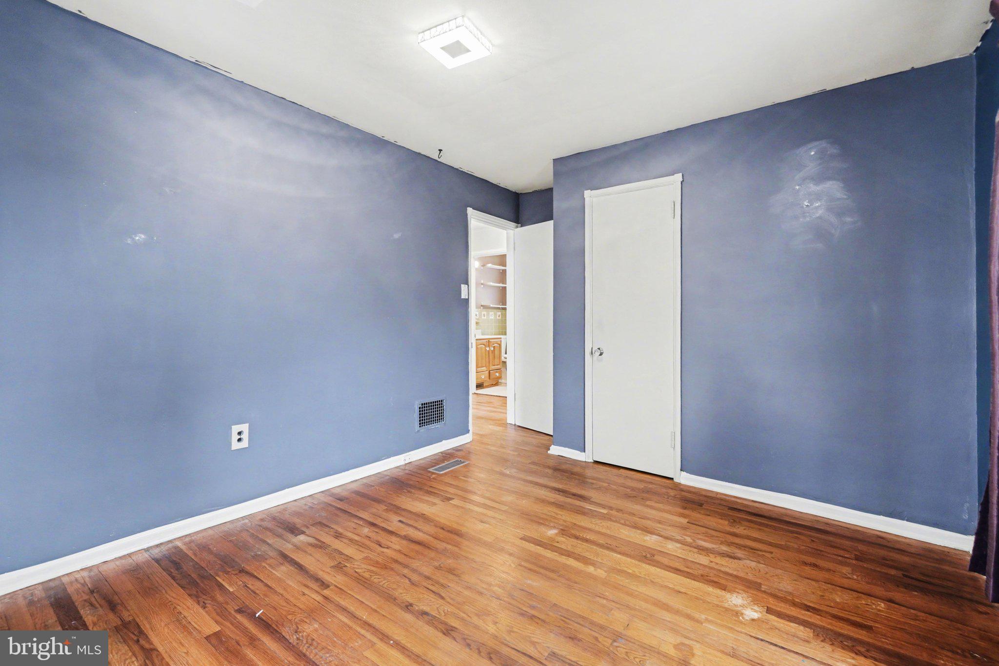 1309 Kingsley Road Camp Hill, PA 17011 - Photo 18 of 30 a view of empty room with wooden floor