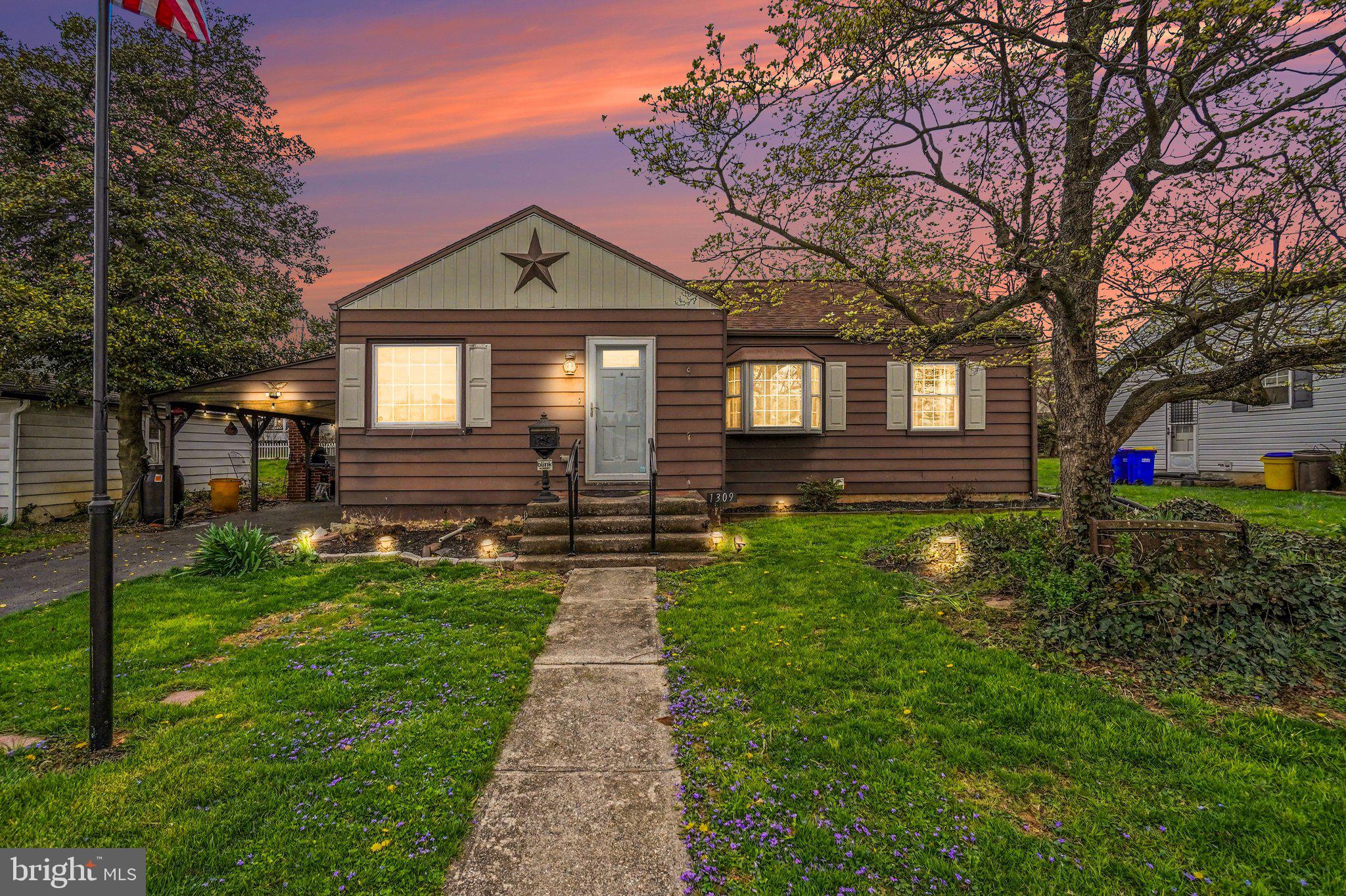 1309 Kingsley Road Camp Hill, PA 17011 - Photo 28 of 30 a front view of a house with a yard