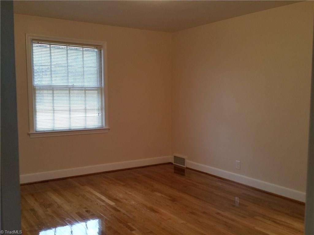 855 Reynolds Road Lewisville, NC 27023 - Photo 11 of 17 Bedrooms have been freshly painted and wood floors refinished.
