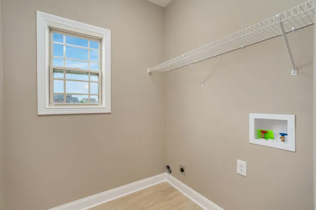 a view of room with window and closet