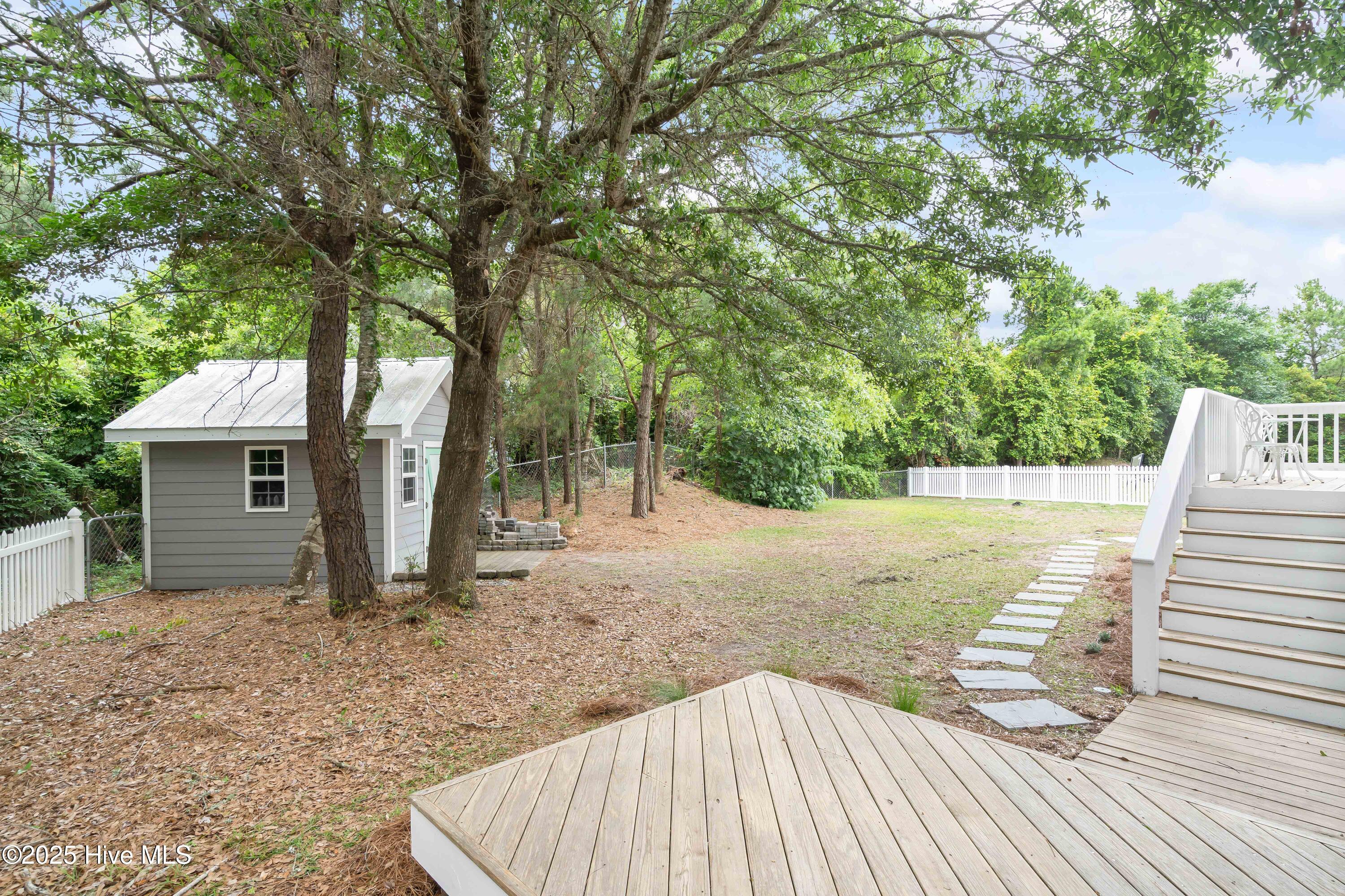 320 Governor Safford Lane Emerald Isle, NC 28594 - Photo 40 of 85 Backyard Shed