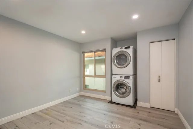 a storage room with washer and dryer