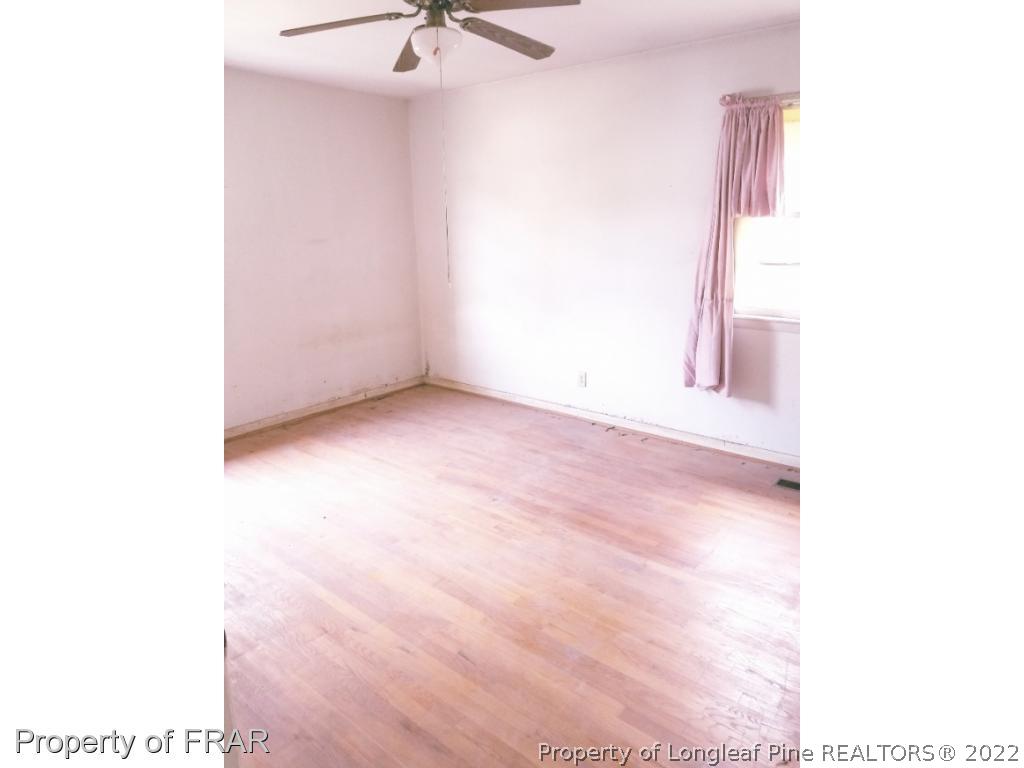 3913 Cumberland Road Fayetteville, NC 28306 - Photo 6 of 13 a view of an empty room