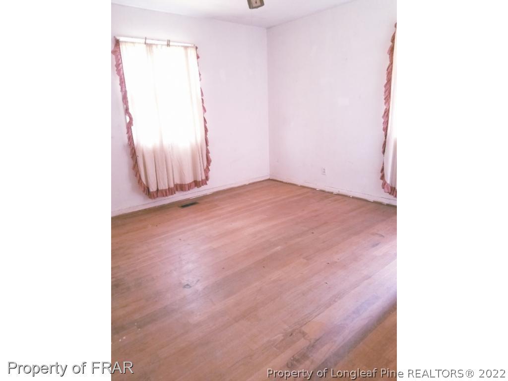 3913 Cumberland Road Fayetteville, NC 28306 - Photo 7 of 13 a view of an empty room