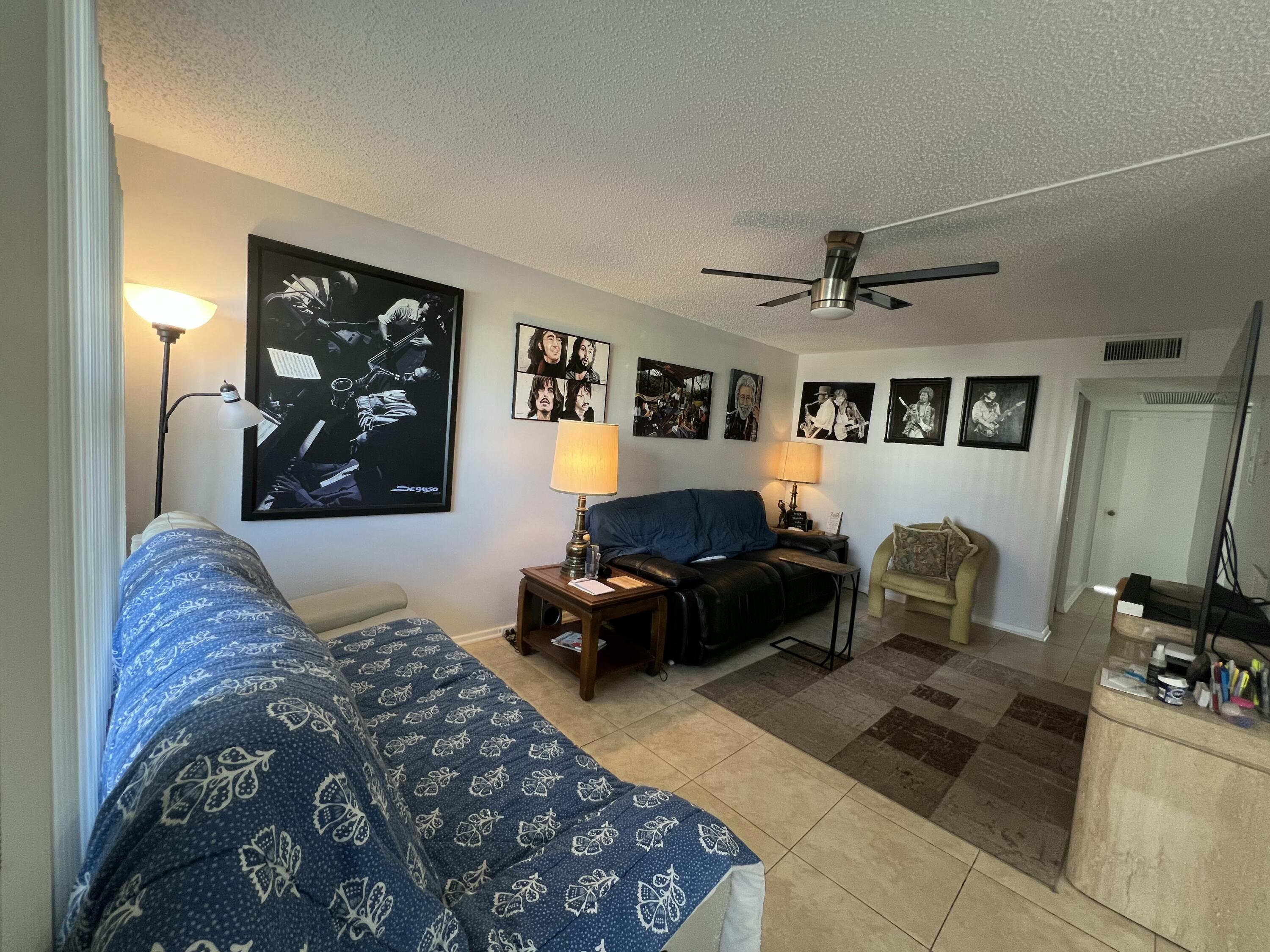 2038 Hythe A Boca Raton, FL 33434 - Photo 11 of 15 a bedroom with furniture and wooden floor