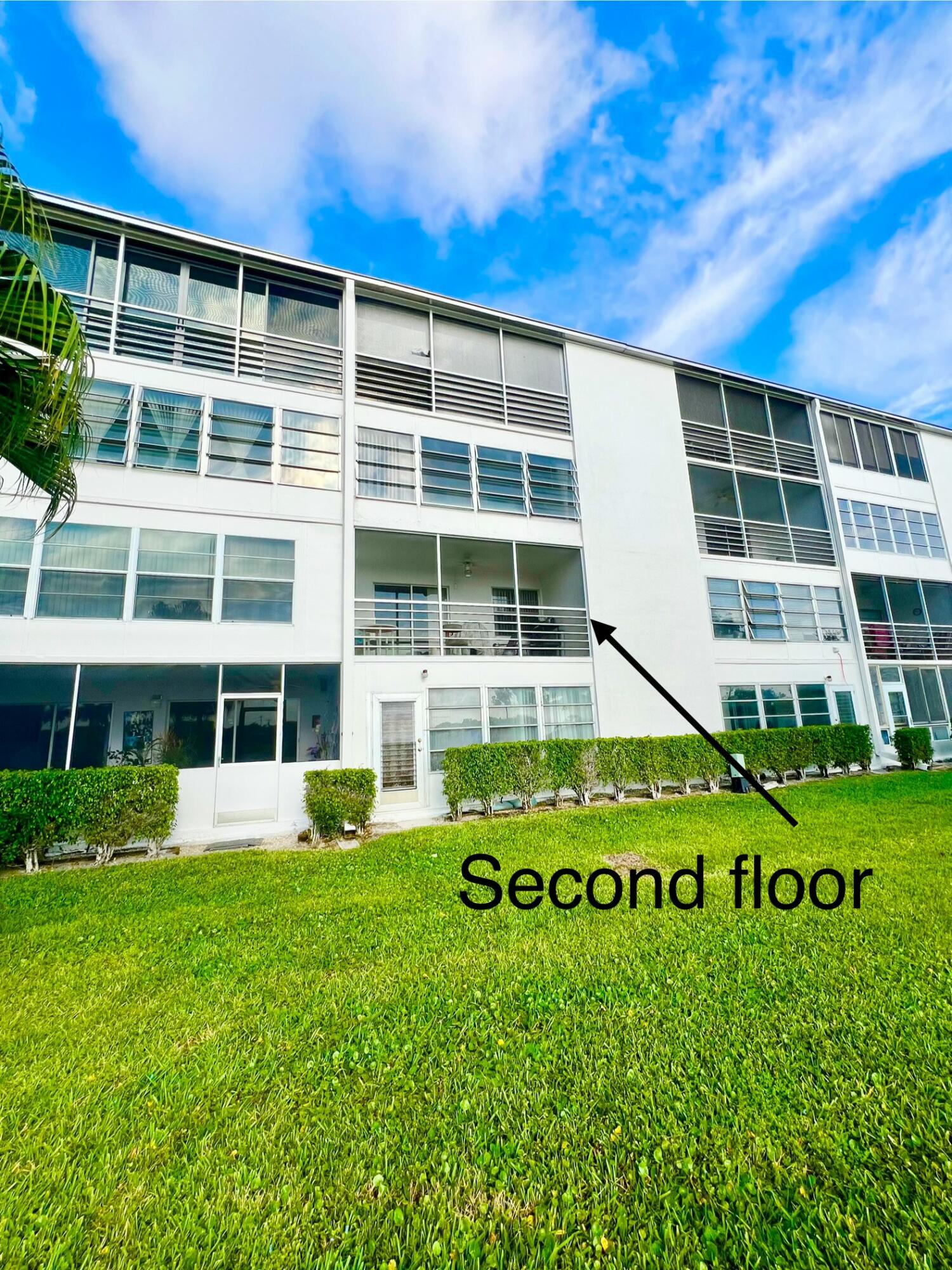 2038 Hythe A Boca Raton, FL 33434 - Photo 6 of 15 a sign on the wall of building