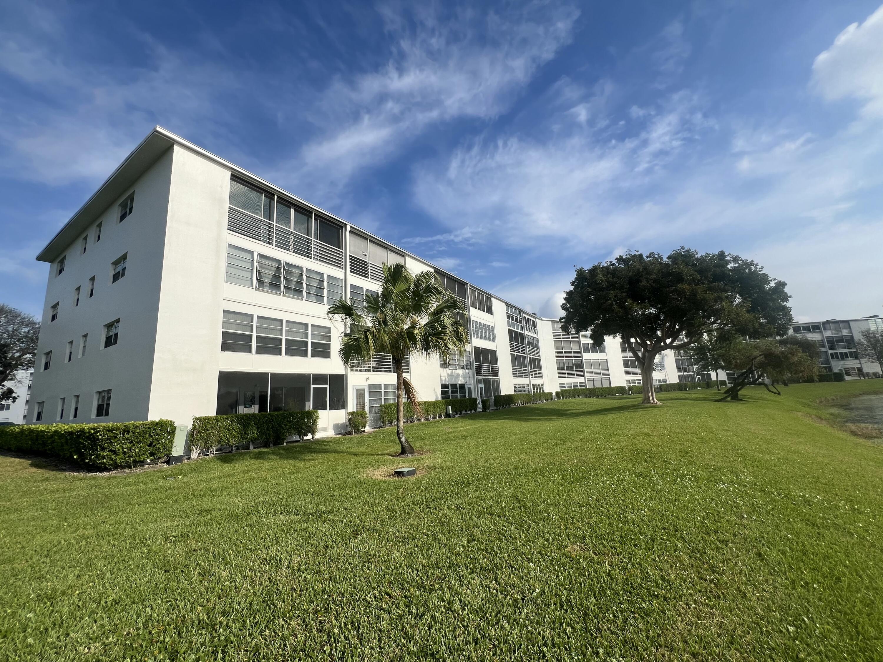2038 Hythe A Boca Raton, FL 33434 - Photo 7 of 15 a view of a house with a big yard