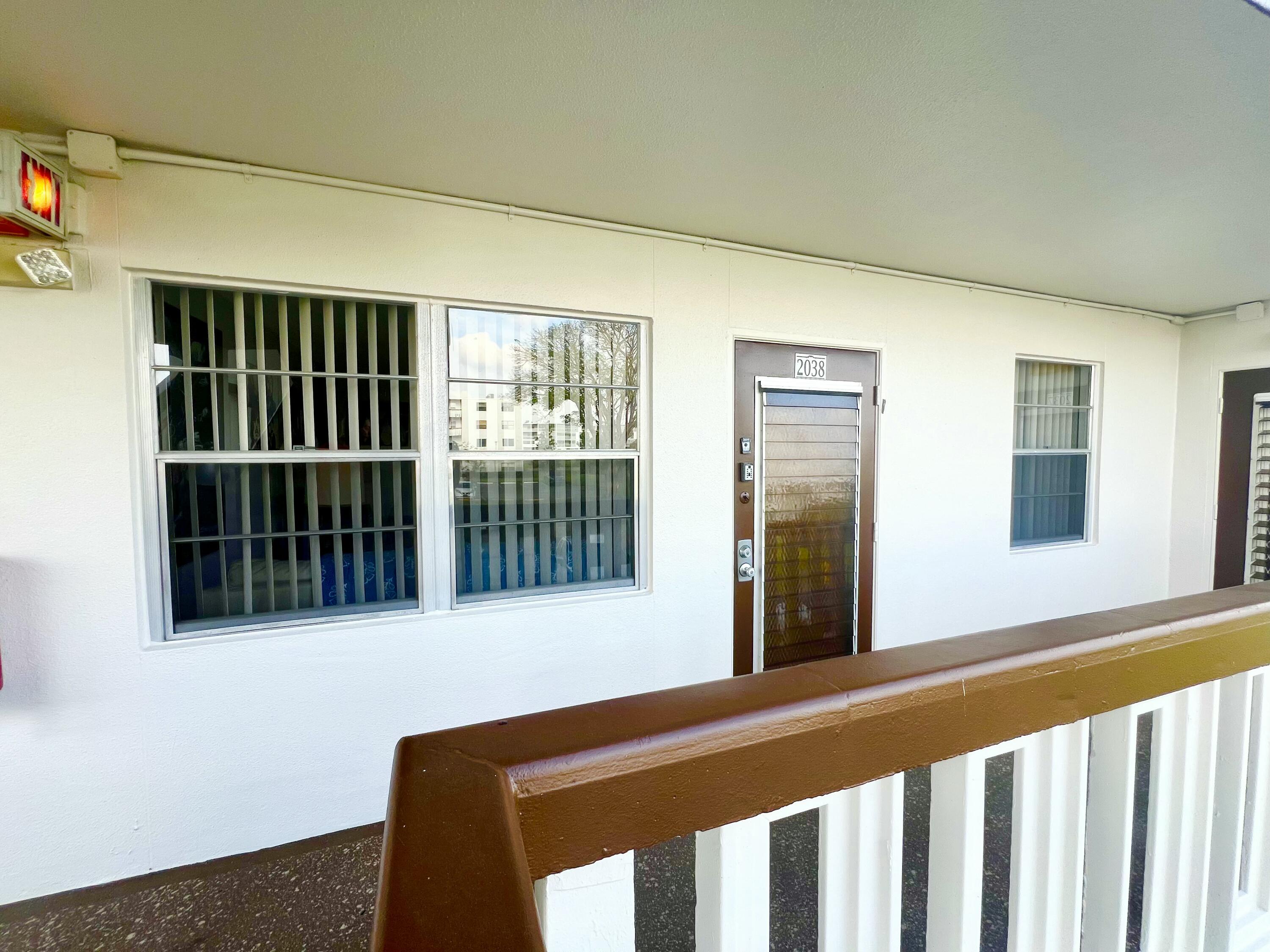 2038 Hythe A Boca Raton, FL 33434 - Photo 9 of 15 a view of a porch with furniture