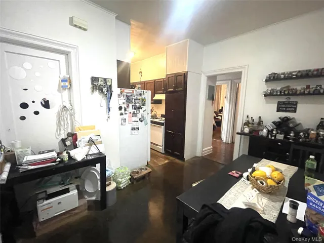 a room with gym equipment and a flat screen tv