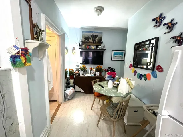 a bedroom with bed and a window